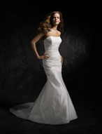 Bridal Dress: AngelinaFaccenda - 1043 - Silk Shantung  The shapely, strapless gown is accented with asymmetrical, crossover draping that hugs the body over the slim, fit and flare skirt with chapel length train. Matching shawl is included. Color Availability: Natural 