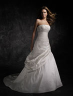 Bridal Dress: AngelinaFaccenda - 1046 - Silk Shantung with Crystal Beading  Crossover draping overlays the strapless bodice with a crystal beaded, empire band 