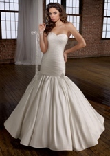 Bridal Dress: Angelina Faccenda: 1225 - Silk Shantung with Beaded Brooch  Removable bow. Color: Natural. Sizes Available: 2-28. 