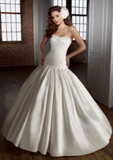 Bridal Dress: Angelina Faccenda: 1227 - Silk Shantung with Beading  Color: Natural. Sizes Available: 2-28. 