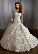 Bridal Dress: Angelina Faccenda: 1228 - Silk Shantung and Organza  Removable flower. Color: Natural. Sizes Available: 2-28.  
