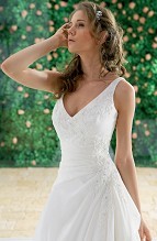 Bridal Dress: F912  Silhouette : A-line, Fabric-top layer : Taffeta, Front Neckline : V-neck, Back Neckline : V-neck, Front Bodice Detail : Gathered Taffeta with lace and Swarovski crystal beading, Back Bodice Detail : Gathered Taffeta with lace and Swarovski crystal beading, Waist : Asymmetric - drop waist, Front Skirt Detail : Draped taffeta detail, Back Skirt Detail : Draped taffeta detail, Front Hem Detail : Lace and Swarovski crystal beading on hem, Back Hem Detail : Lace and Swarovski crystal beading on hem 