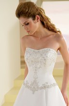 Bridal Dress: T944  Silhouette: A-line, Fabric-top layer: Couture Satin and Satin Faced Organza, Front Neckline: Strapless sweetheart, Back Neckline: Strapless, Front Bodice Detail: Robison-Anton platinum embroidery and Swarovski crystal beading, Back Bodice Detail: Robison-Anton platinum embroidery and Swarovski crystal beading, Waist: Basque waist, Front Skirt Detail: Robison-Anton platinum embroidery and Swarovski crystal beading, Satin faced organza inset features at back with scalloped edge, Back Skirt Detail: Robison-Anton platinum embroidery and Swarovski crystal beading, Satin faced organza inset features at back with scalloped edge 