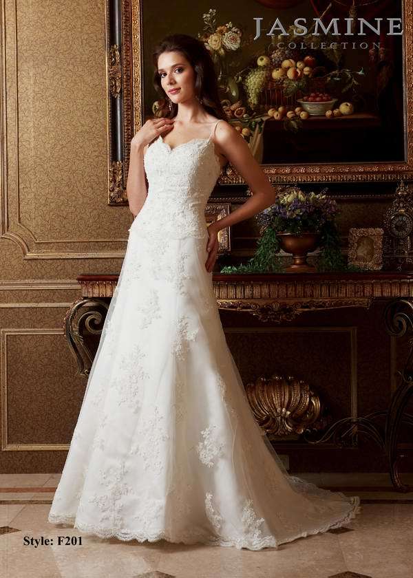 Bridal Dress: COLLECTION BRIDAL - F201  Catalogue Color:  IVORY (IV)  Silhouette:  Lace overlay gown with beaded spaghetti straps. Scallop edge along the neckline and hem of the skirt.  Fabric-top layer:  TULLE and ITALIAN SATIN  Accessory:  N/A  Skirt Length:  Court Train  Size Range:   4-28  