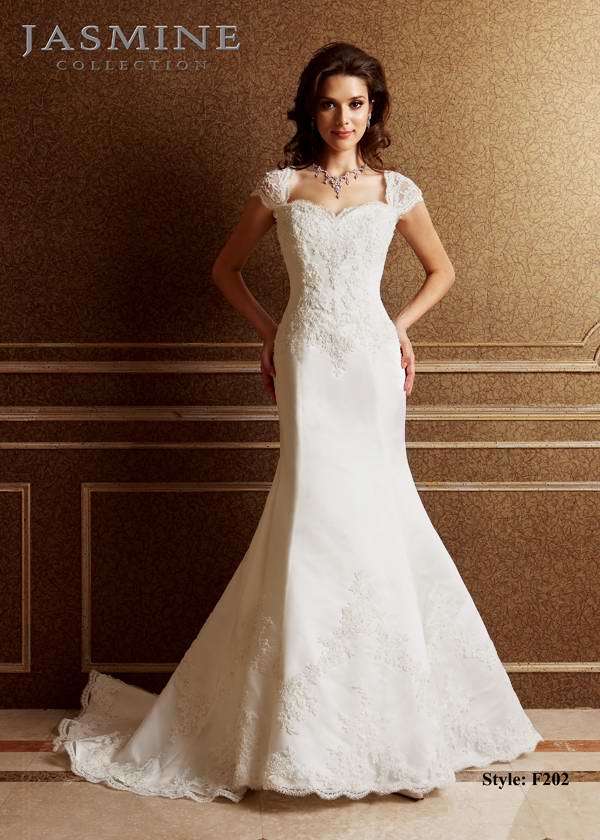 Bridal Dress: COLLECTION BRIDAL - F202  Catalogue Color:  IVORY (IV)  Silhouette:  Attached sheer cap sleeves with beaded lace. A-line skirt with scallop trim at hem. Covered buttons to end of zipper  Fabric-top layer:  ITALIAN SATIN and TULLE  Accessory:  N/A  Skirt Length:  Court Train  Size Range:   4-28  