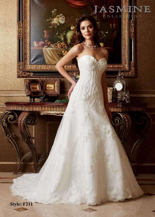 Bridal Dress: COLLECTION BRIDAL - F211  Catalogue Color:  IVORY (IV)  Silhouette:  Sweetheart strapless gown. Beaded lace on entire gown with scallop trim at hem of skirt  Fabric-top layer:  TULLE  Accessory:  N/A  Skirt Length:  Chapel Train  Size Range:   4-28  