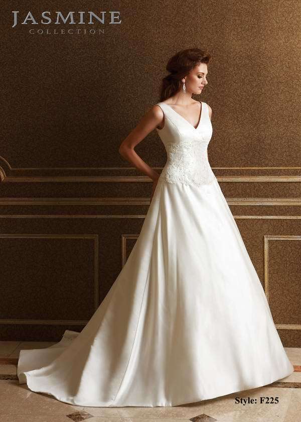 Bridal Dress: COLLECTION BRIDAL - F225  Catalogue Color:  IVORY (IV)  Silhouette:  V neckline with beaded lace on waist. Covered buttons to end of train  Fabric-top layer:  ITALIAN SATIN  Accessory:  N/A  Skirt Length:  Chapel Train  Size Range:   4-28  