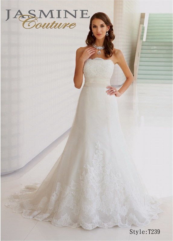 Bridal Dress: COUTURE BRIDAL - T239  Catalogue Color:  IVORY (IV)  Silhouette:  Strapless silk organza gown with beaded lace top and gathered waist.  Fabric-top layer:  SILK ORGANZA  Accessory:  N/A  Skirt Length:  Chapel Train  Size Range:   4-28  
