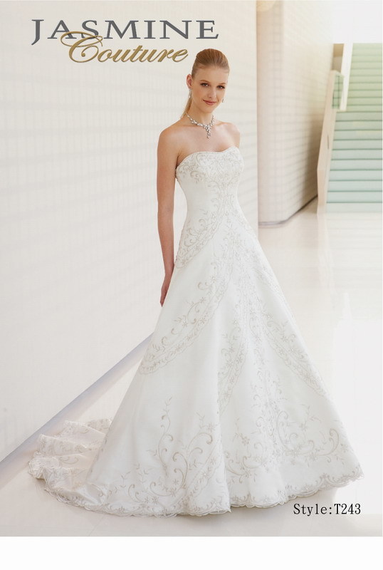 Bridal Dress: COUTURE BRIDAL - T243  Catalogue Color:  IVORY (IV)  Silhouette:  Strapless couture satin dress with beaded embroidery throughout.  Fabric-top layer:  COUTURE SATIN  Accessory:  N/A  Skirt Length:  Tiffany Train  Size Range:   4-28  