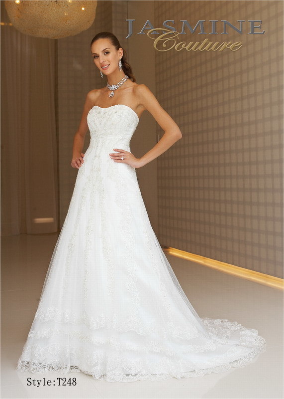Bridal Dress: COUTURE BRIDAL - T248  Catalogue Color:  IVORY (IV)  Silhouette:  Strapless beaded lace gown.  Fabric-top layer:  Lace netting and COUTURE SATIN  Accessory:  N/A  Skirt Length:  Chapel Train  Size Range:   4-28  