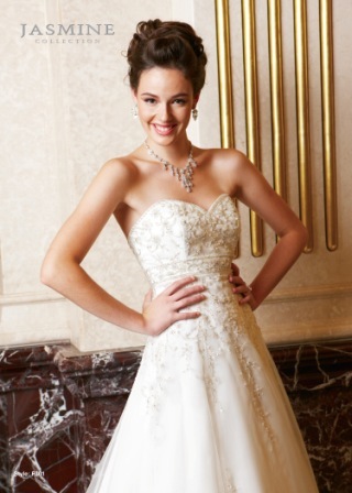 Bridal Dress: COLLECTION BRIDAL - F301  Catalogue Color:		IVORY (IV)	Fabric-top layer:		ORGANZA	Accessory:		N/A	Skirt Length:		Tiffany Train	Size Range: 		4-28 