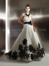 Bridal Dress: COLLECTION COUTURE FALL 2011 - T481  Catalogue Color:  	IVORY (IV)-BLACK (BK)Fabric-top: 	TULLE and 2 inches ribbon sashAccessory: 	Flower with ribbon sashSkirt Length: 	Tiffany trainRemark: 	Optional style number T481B for ribbon in accent color only:Gown & Floral in White (WH) or Ivory (IV) with any color of Couture 2 inches ribbon.Size Range: 	4-28 