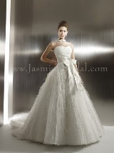 Bridal Dress: COLLECTION COUTURE FALL 2011 - T487  Catalogue Color:  	IVORY (IV)-IVORY (IV)Fabric-top: 	LUX ORGANZA, ORGANZA and 3 3/4 inches ribbon sashAccessory: 	Rhinestone brooch with ribbon sashSkirt Length: 	Tiffany trainSize Range: 	4-28 