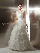 Bridal Dress: COLLECTION COUTURE FALL 2011 - T496  Catalogue Color:  	IVORY (IV)Fabric-top: 	LUX ORGANZAAccessory: 	Flower waistband, detachable skirtSkirt Length: 	Knee length with detachable Court train skirtSize Range: 	4-28 