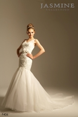 Bridal Dress: COLLECTION BRIDAL - F406  Catalogue Color:		IVORY (IV)	Fabric-top layer:		TULLE, ORGANZA and COUTURE SATIN	Accessory:		Flower sash	Skirt Length:		Tiffany Train	Size Range: 		4-28 