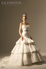 Bridal Dress: COLLECTION BRIDAL - F411  Catalogue Color:		IVORY (IV)	Fabric-top layer:		ITALIAN SATIN	Accessory:		Beaded embroidery sash	Skirt Length:		Tiffany train	Size Range: 		4-28 