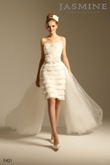 Bridal Dress: COLLECTION BRIDAL - F421  Catalogue Color:		IVORY (IV)	Fabric-top layer:		ORGANZA and ITALIAN SATIN	Accessory:		Detachable Chapel train	Skirt Length:		Knee length with detachable Chapel train	Size Range: 		4-28 