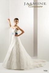 Bridal Dress: COLLECTION COUTURE - T436  Catalogue Color:		IVORY (IV)-TEAL (TL)	Fabric-top layer:		SATIN FACED ORGANZA and MATTE TAFFETA	Accessory:		Flower	Skirt Length:		Tiffany Train 75