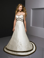 Bridal Dress: Bridals: 2226 - Duchess Satin with Embro  Satin edges the sweetheart strapless neckline with embroidery meeting the peaked empire bands. The beaded embroidery cascades onto the A-line skirt with bands surrounding the hemline and chapel length train. Colors: White/Silver, Pearl/Silver Trim Color Available in all Mori Lee Bridesmaid Satin Colors 