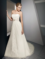 Bridal Dress: Bridals: 2309 - Delicate Chiffon with Cr  Satin edges the contoured, strapless neckline with draping extending up from the empire. Crystals and stones are clustered between the satin bands that trim the waistline and meet the A-line skirt with split front overlay and chapel length train. Colors: White/Silver, Ivory/Silver 