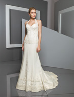 Bridal Dress: Bridals: 2315 - Beaded Lace on Net  Bands of lace decorate the fitted bodice with sweetheart neckline and sheer, halter straps. The dropped waistline meets the slim, A-line skirt with lace surrounding the hemline and chapel length train. Removable Halter Straps Available in 3 Lengths 55