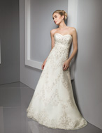 Bridal Dress: Bridals: 2317 - Elaborate Embroidery on  Satin bands edge the sweetheart strapless neckline and empire on the A-line gown with an all over, sparkling embroidery design and chapel length train. Available in 3 Lengths 55