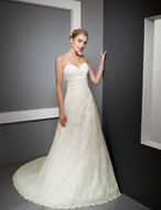 Bridal Dress: Bridals: 2319 - Alencon Lace with Satin  Crystal beading adorns the all-over alencon lace gown with a sweetheart strapless neckline and A-line skirt. A satin band frames the empire with cascading streamers onto the chapel length train. Available in 3 Lengths 55