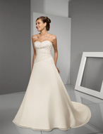 Bridal Dress: Blu: 4503 - Delicate Chiffon with Embroi  Beaded embroidery overlays the sweetheart, strapless bodice and meets the crossover draping onto the dropped waistline. The soft, A-line skirt has embroidery decorating the chapel length train. Colors: White/Silver, Ivory/Silver 