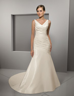 Bridal Dress: Blu: 4507 - Radiant Taffeta  Asymmetrical draping forms the V-neckline and cascades over the torso of this elegant fit and flared gown with chapel length train. Colors: White, Ivory 