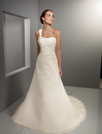 Bridal Dress: Blu: 4514 - Delicate Chiffon with Embroi  Embroidered appliques trim the asymmetrical draping on the A-line gown with a chapel length train. The gown features a removable one shoulder, draped strap. Colors: White/Silver, Ivory/Silver 