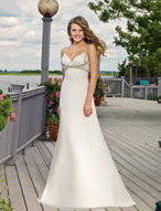 Bridal Dress: Destination/Voyage: 6301 - Delicate Chif  Beaded shoulder straps support the draped, sweetheart neckline and crisscross onto the back and empire of the soft A-line gown. Colors: White/Silver, Ivory/Silver 