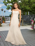 Bridal Dress: Destination/Voyage: 6303 - Delicate Chif  Crystal beads are sprinkled onto the strapless neckline and asymmetrically draped overskirt on the A-line gown with a corset tie-back closure. Colors: White/Silver, Ivory/Silver 