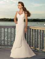 Bridal Dress: Destination/Voyage: 6305 - Delicate Chif  The beaded halter straps support the surplus bodice with asymmetrical draping that cascades onto the overskirt on the soft, A-line gown. Colors: White/Silver, Ivory/Silver 
