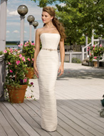 Bridal Dress: Destination/Voyage: 6311 - Delicate Chif  Soft draping overlays the strapless sheath gown with back skirt slit. Beaded satin tie sash and matching shawl. Colors: White, Ivory 