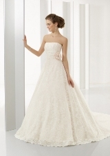 Bridal Dress: Bridal Blu Collection: 4528 - Romantic Lace  Removable Flower Available in 3 Lengths: 55