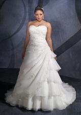 Bridal Dress: Mori Lee Julietta: 3072 - ORGANZA WITH EMBROIDERY  Embroidered appliques decorate the strapless, surplus bodice with asymmetrical draping shaping the overskirt. Tiered organza creates the A-line skrit and wraps onto the chapel train. Available in three lengths: 55
