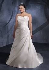 Bridal Dress: Mori Lee Julietta: 3074 - DUCHESS SATIN WITH BEADING  Clusters of beads decorate the sweetheart, strapless bodice with asymmetrical draping over the torso and onto the slim, A-line skirt. The corset tie back meets the flowing chapel train. Colors Available: White/Silver, Ivory/Silver.* Please Note Shawls Are Not Included 