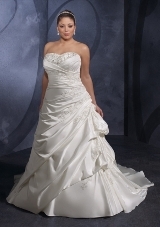 Bridal Dress: Mori Lee Julietta: 3078 - SATIN FACED TAFFETA WITH EMRBOIDERY  Intricate embroidery decorates the strapless bodice with crossover draping over the torso and onto the waterfall skirt. The corset tie back meets the billowy chapel train. Colors Available: White/Silver, Ivory/Silver.* Please Note Shawls Are Not Included 