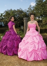 Quinceanera Dress: Quinceanera/Vizcaya: 87050 - TAFFETA WITH BEADED FLOWERS  Taffeta with Beaded Flowers. Matching Bolero. Colors Available: White, Bright Purple, Flamingo, Raspberry. BOLERO JACKET INCLUDED 