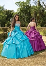 Quinceanera Dress: Quinceanera/Vizcaya: 87054 - BEADED TAFFETA WITH REMOVABLE HALTER STRAPS AND FLOWERS  Beaded Taffeta. Matching Stole. Removable Halter Straps. Colors Available: Capri, Bright Purple, Olive. SHAWL INCLUDED 