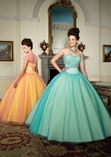 Quinceanera Dress: Quinceanera/Vizcaya: 87024 - Layered Tulle with Beading  Matching Bolero Jacket. Colors: Starburst, Serene, Sea Breeze 