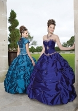 Quinceanera Dress: Quinceanera/Vizcaya: 87035 - Silky Taffeta with Embroidery  Matching Bolero Jacket. Colors: Deep Purple, Mediterranean, Claret, Cerise 