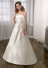 Bridal Dress: Mori Lee Voyage FALL 2011 Collection: 6712 - Duchess Satin with Beaded Brooch  Colors: White, Ivory. Sizes Available: 2-28.  