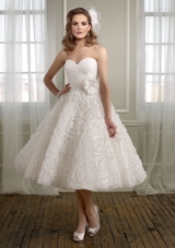 Bridal Dress: Mori Lee Voyage FALL 2011 Collection: 6716 - Floral Organza  Matching satin tie sash with flower. Colors: White, Ivory. Sizes Available 2-28.  