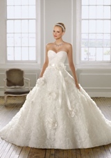 Bridal Dress: Mori Lee Bridal Collection: 1601 - Organza with floral design  Ribbon waist sash with flower. Colors: White, Ivory. Sizes Available 2-28. 