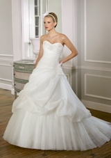Bridal Dress: Mori Lee Bridal Collection: 1604 - Embroidered Organza and Tulle  Removable flowers. Colors: White/Silver, Ivory/Silver. Sizes Available: 2-28. Available in three lengths: 55