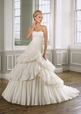 Bridal Dress: Mori Lee Bridal Collection: 1607 - Taffeta with Appliqued floral embroidery  Removable accent flowers. Colors: White/Silver, Ivory/Silver. Sizes Available 2-28. 