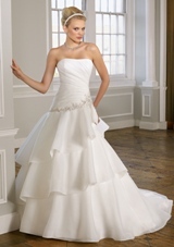 Bridal Dress: Mori Lee Bridal Collection: 1618 - Organza with embroidery  Removable bow. Colors: White/Silver, Ivory/Silver. Sizes Available: 2-28. Available in three lenghts: 55