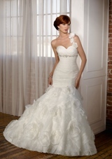 Bridal Dress: Mori Lee Blue Collection: 4814 - Organza with jeweled beading  Removable flowered one shoulder strap. Colors: White/Silver, Ivory/Silver. Sizes Available: 2-28. Available lengths: 55