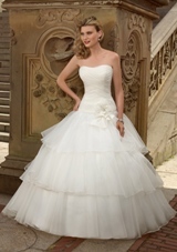 Bridal Dress: Mori Lee Voyage Collection: 6708 - Organza  Removable flower. Colors: White, Ivory. Sizes Available: 2-28. Available in three lengths: 55